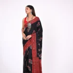 Yamini / An Ajrakh Modal Silk Saree
